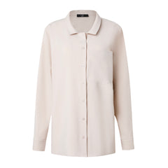 women's beige long sleeve button down with chest pocket on a white background