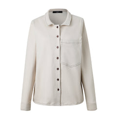 A bone denim long sleeve button-down shirt with front pocket, collar, and button-up front.