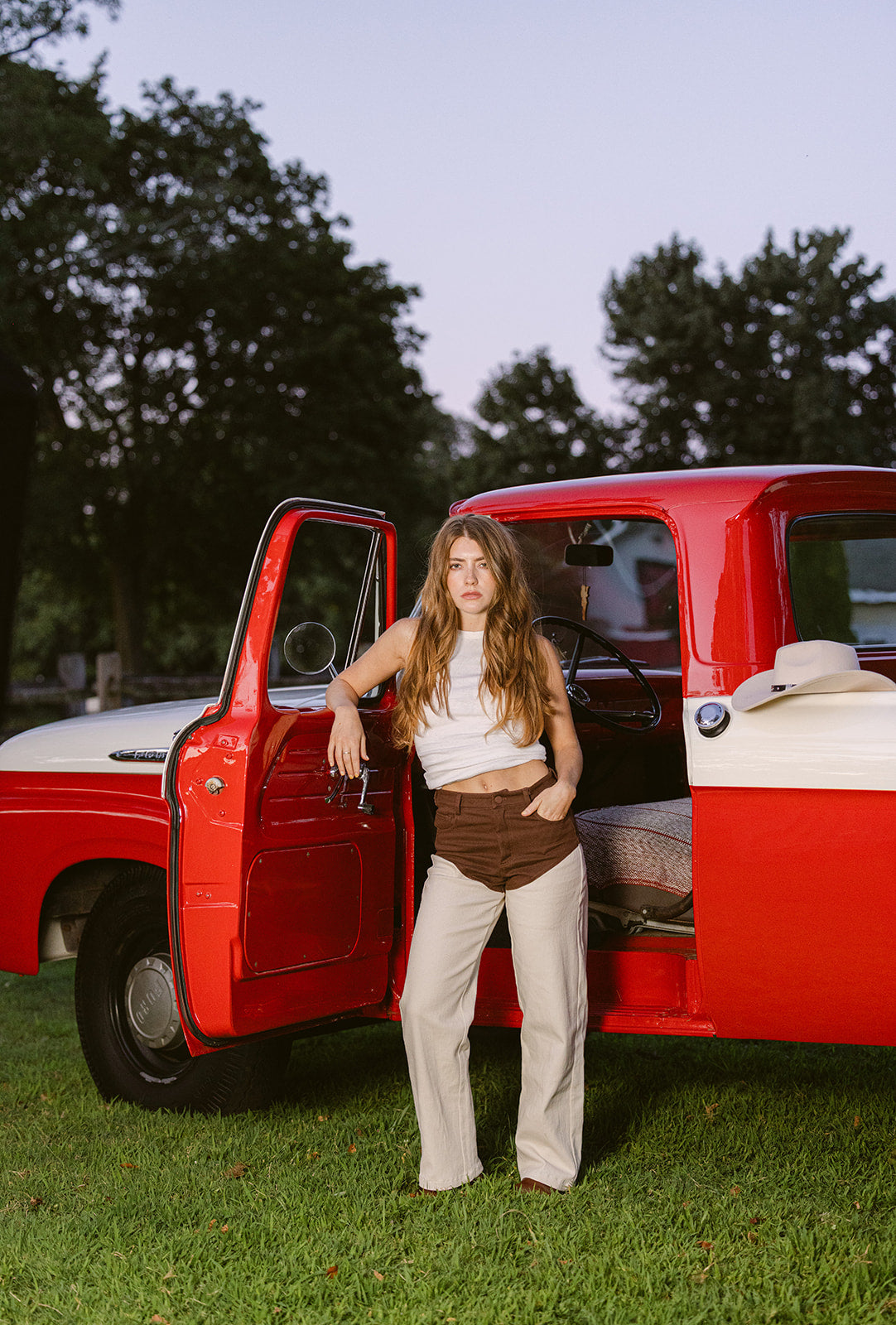 model wearing two-tone bone denim pants